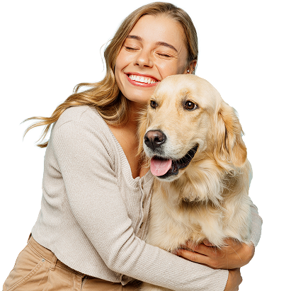 Dog owner giving her white Labrador a big hug