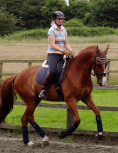 woman riding a horse
